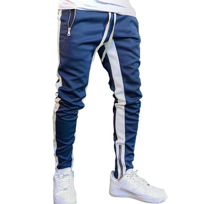 Calça Men's Fitness Sweatpants O corte skinny garante um visual lisonjeiro, enquanto o cordão na cintura proporciona um ajuste confortável e personalizado. Além disso, os dois bolsos laterais são perfeitos para guardar o telefone ou as chaves.