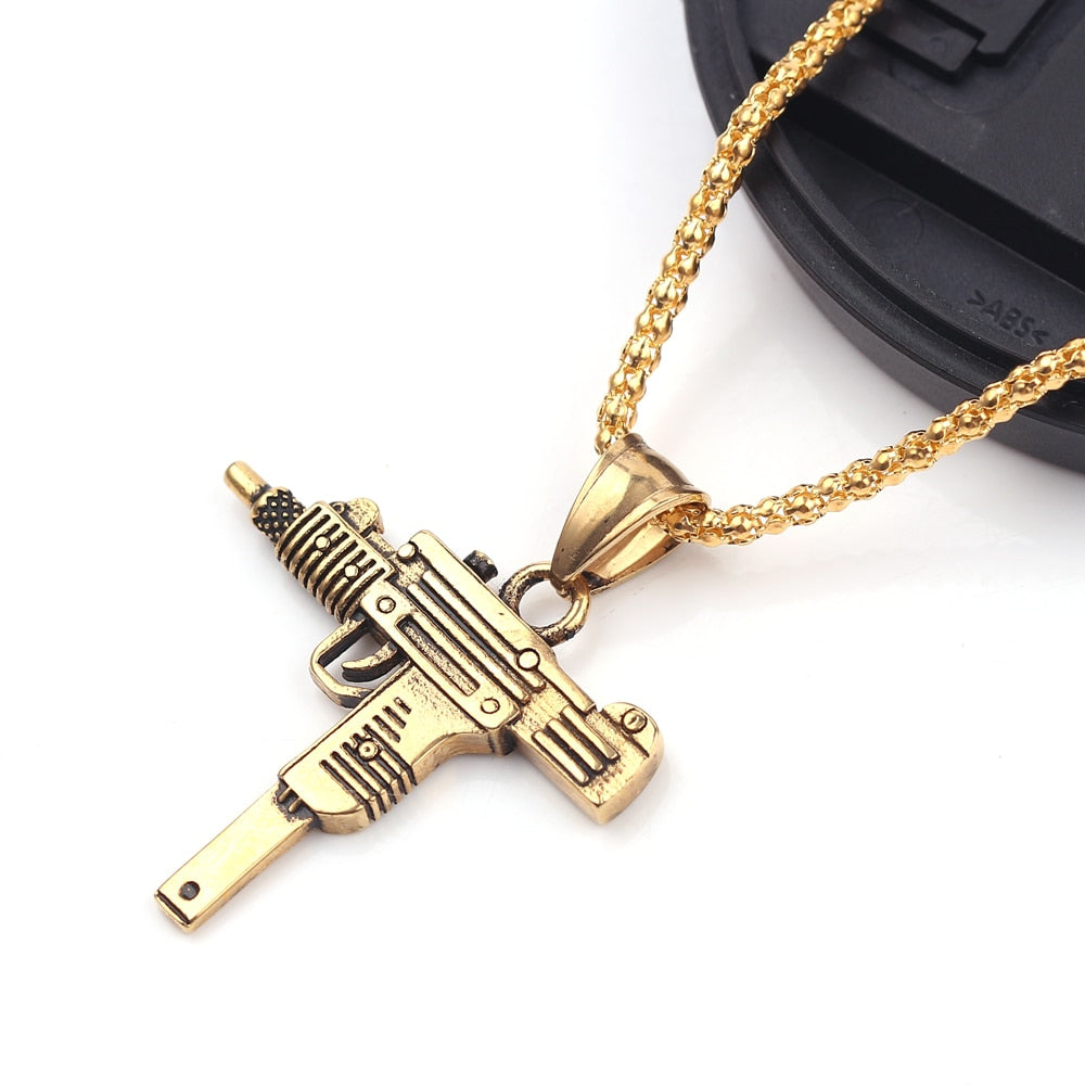 Submachine Gun Pistol Necklaces Apresentando o colar de pistola de metralhadora! Este colar elegante e exclusivo é perfeito para qualquer homem que entende de moda.