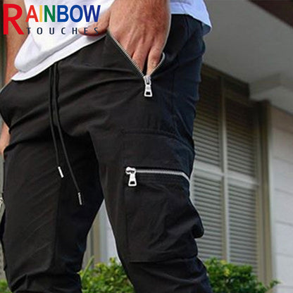 Calça Zip Pocket Men's Cargo Pants calça cargo versátil e estilosa que possa levá-lo da academia para a rua? Não procure mais, nossas calças cargo masculinas com bolso com zíper.